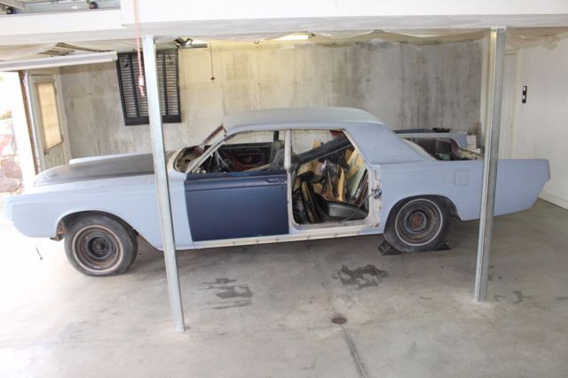 1967 Lincoln Continental Suicide 4 door sedan
